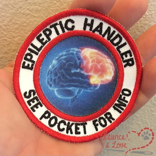 Epileptic Handler See pocket for info, printed brain in center, 3 inch round patch